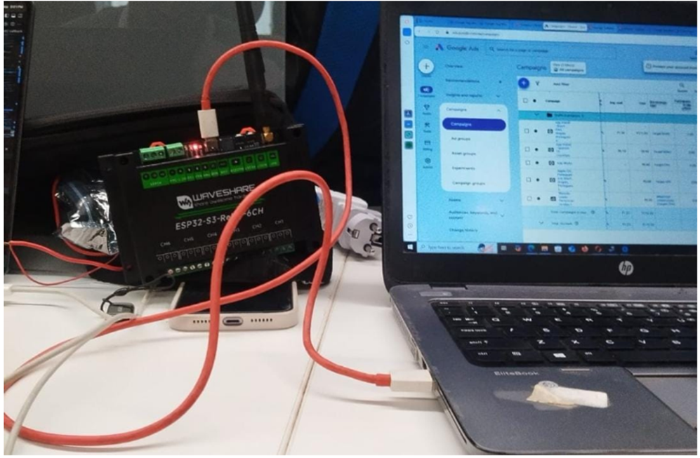 Waveshare ESP32-S3 relay module connected to a laptop via Type-C cable